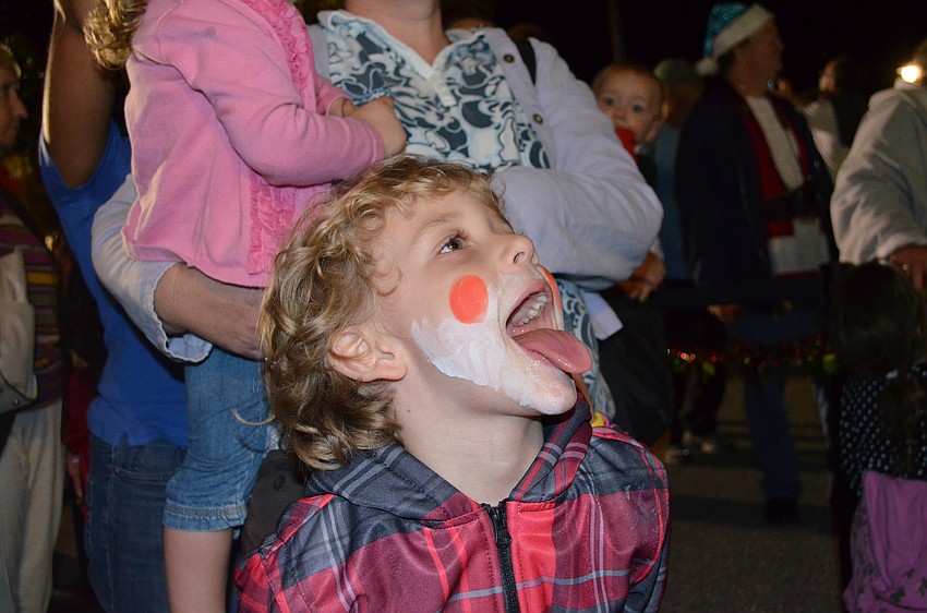Coltrane Marcusky tries to catch snowflakes with his tongue.