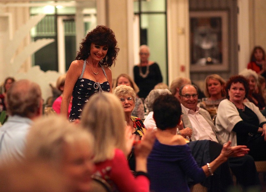 Victoria Jacobson makes her way to the catwalk in a nautical dress from Main Street Traders.
