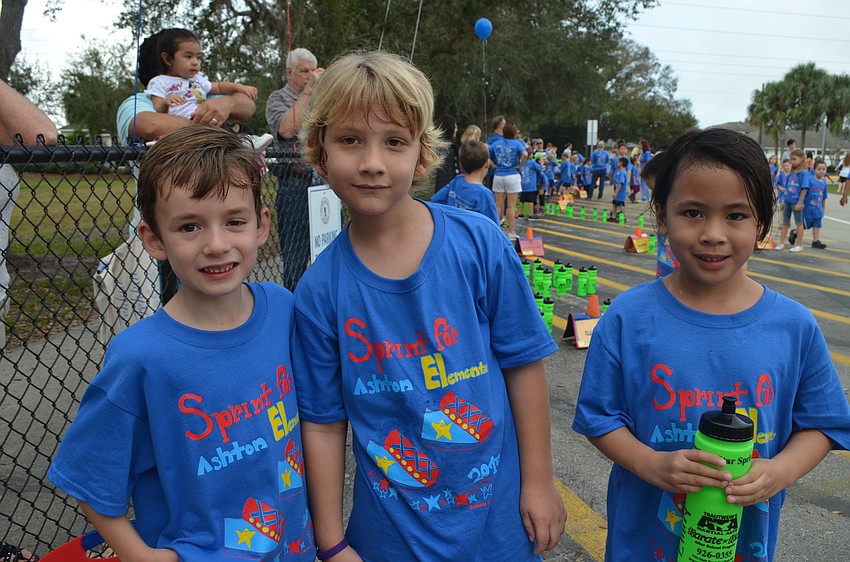 Connor Smith, Joel Strutzman and Emily Fung take a water break.