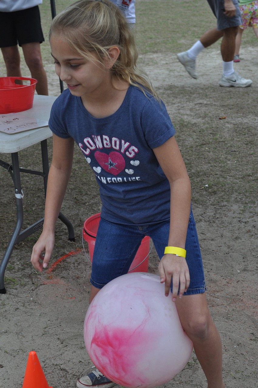 Fifth grader Mallory Shirley readied for an obstacle course.