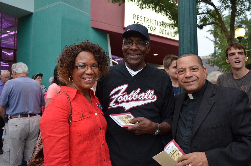 Gene Slaughter, George Williams and Rev. Mario Castro from Church of the Redeemer.
