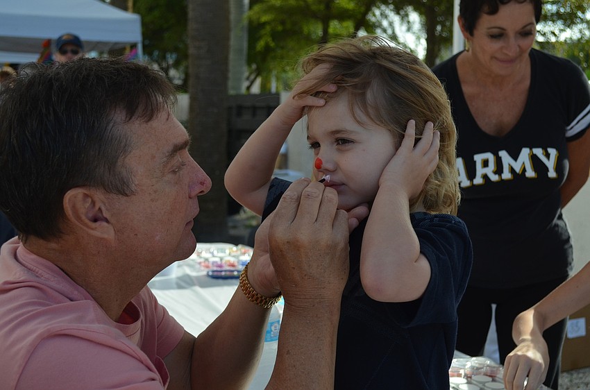 Finnigan Lankford has his face painted.