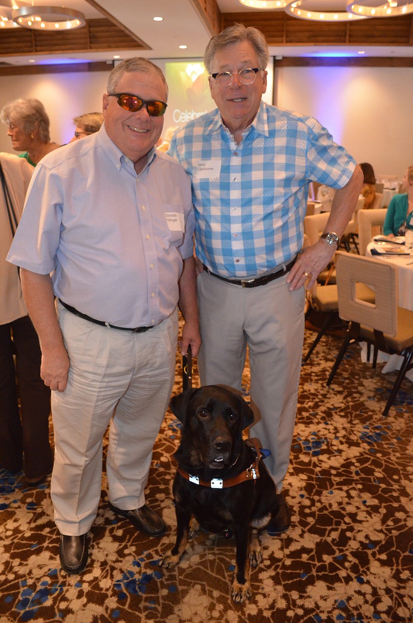 Guest speaker Donald Olinger with guide Ralphie and Jerry Clairborne