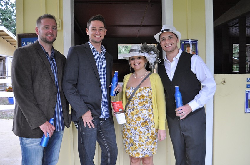 Jim and Robert Reardon and Nicole and Jordan Houseman meet some of SMARTâ€™s horses.