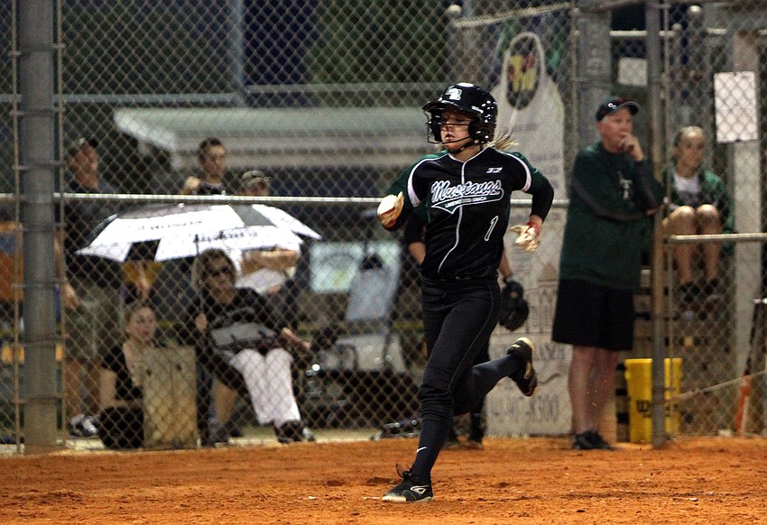 Lakewood Ranchâ€™s Jacqueline Schoff, No. 1, makes it to home plate.