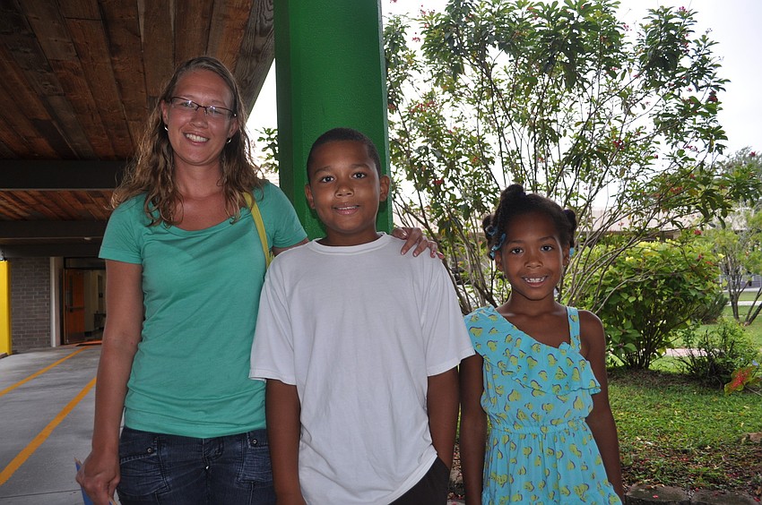 Jerolene Beechy with her children Yoel, a fourth grader at Bashaw Elementary School and Jasmine, a second grader