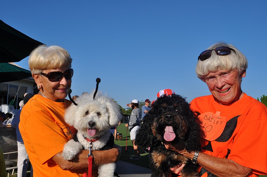 Parade committee leaders Gina Garis and Doris Collins with Brandy and Bailey