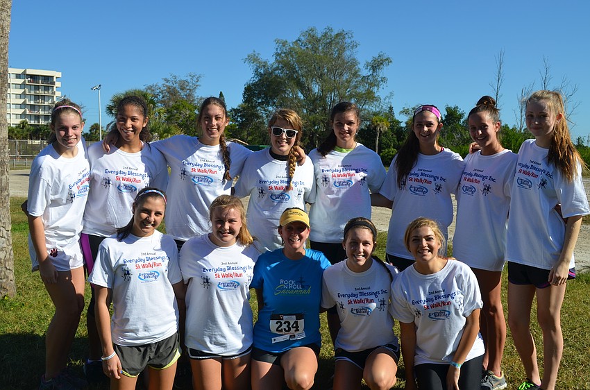 Trish Adams with the volunteers from Cardinal Mooney