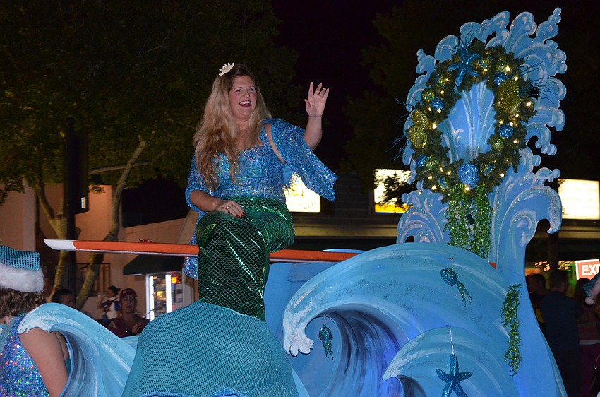 Floats were both Christmas- and beach-themed.