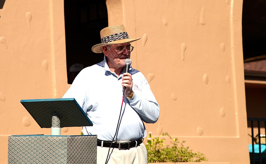 Monsignor Gerard Finegan welcomes the crowd.
