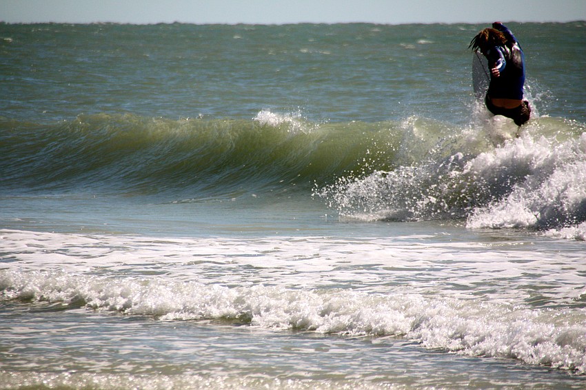 Surfers at Lido Beach.