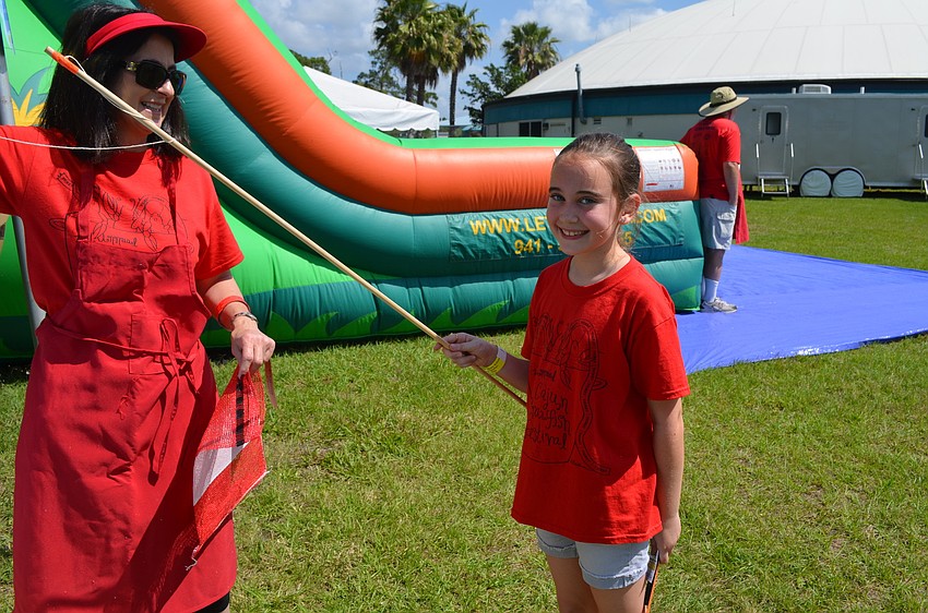 Mackenzie Rouse fishes for prizes.