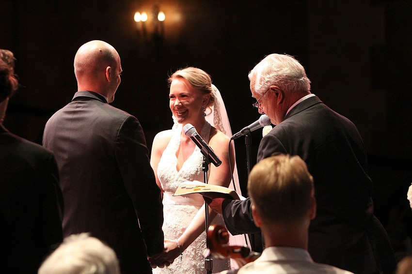 Joseph Sckowska and Emily Forbes with Forbes' grandfather, Warren Diehl.