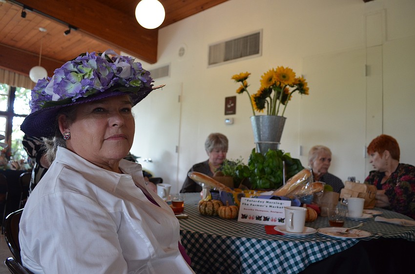 Event Chairwoman Dorothy Thompson decorated the Sarasota Farmerâ€™s Market table