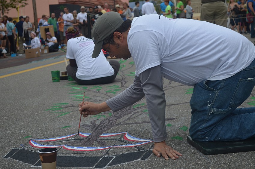 Artist and designer Anthony Cappetto works on Liberty Tree