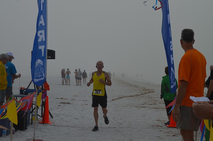 Joe Potkalitsky crosses the finish line.