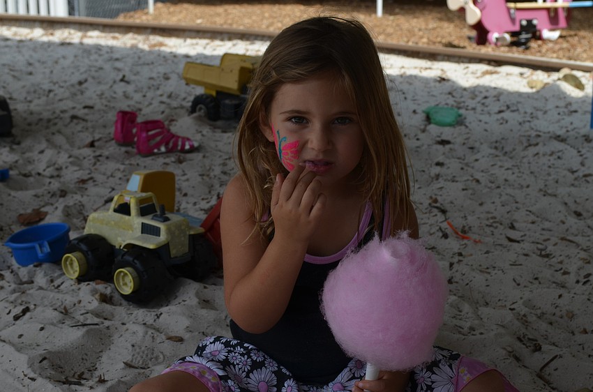 Dani Mallitz enjoys cotton candy.