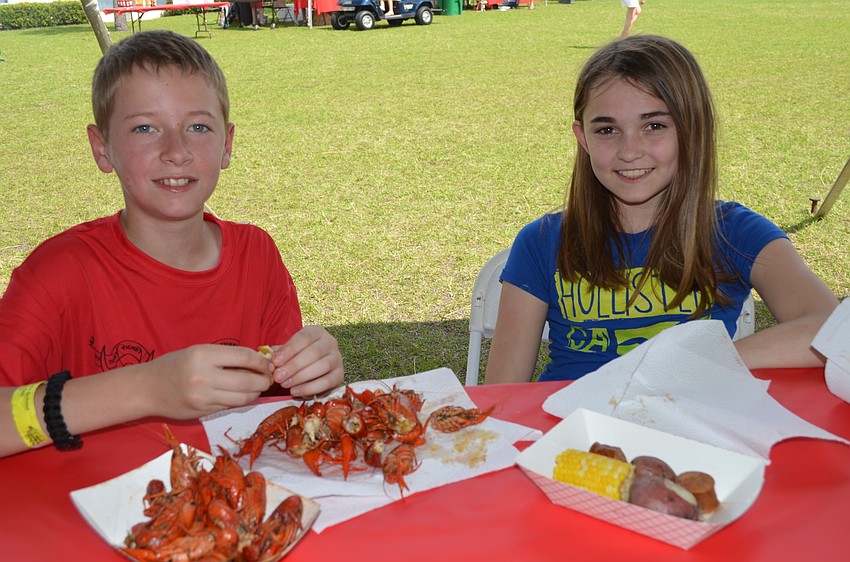 Charles Scarbrough and Jadeyn Warkentine have crawfish.