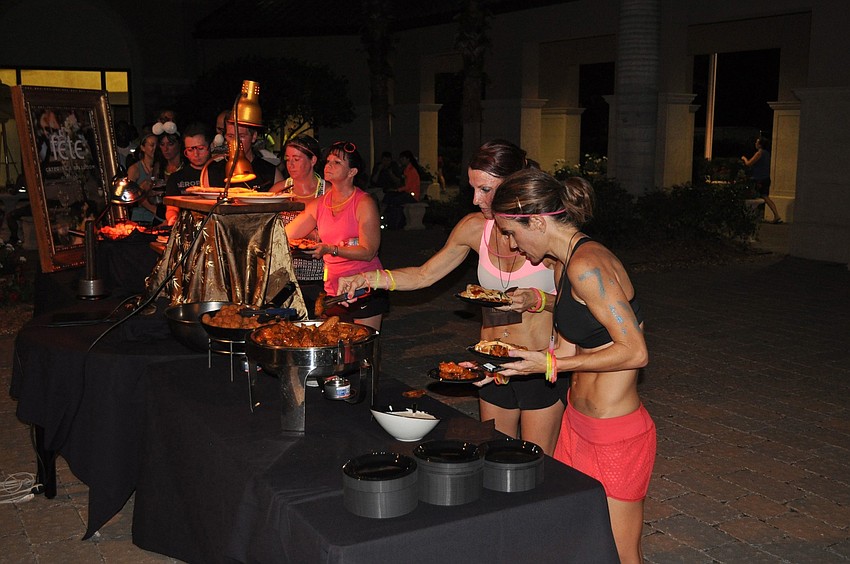 Runners were happy to chow down on food from Fete Catering after the race.