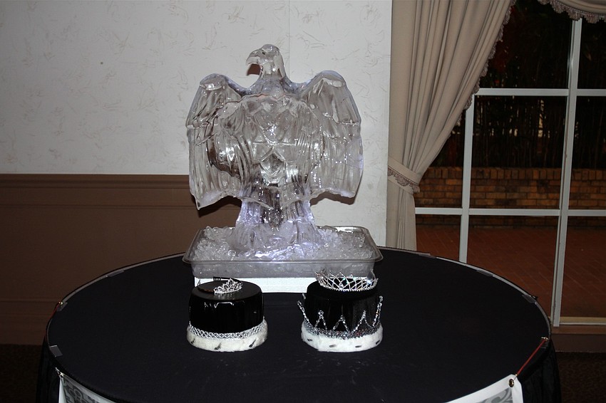 There was an ice sculpture of an eagle on the table with the crowns for the prince, princess, king and queen of the prom.