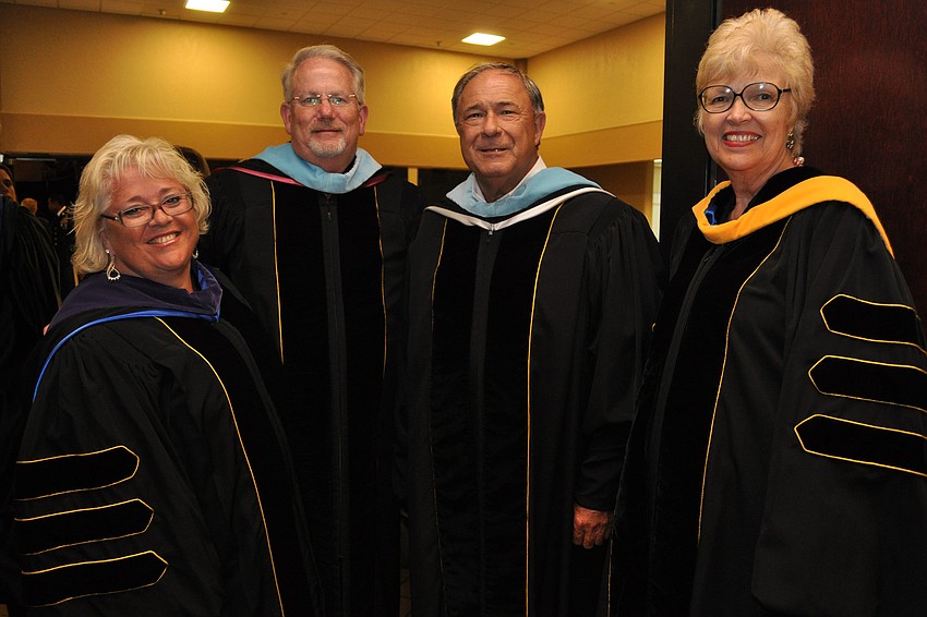 School Board member Julie Aranibar with Superintendent Rick Mills and board members David Miner and Karen Carpenter