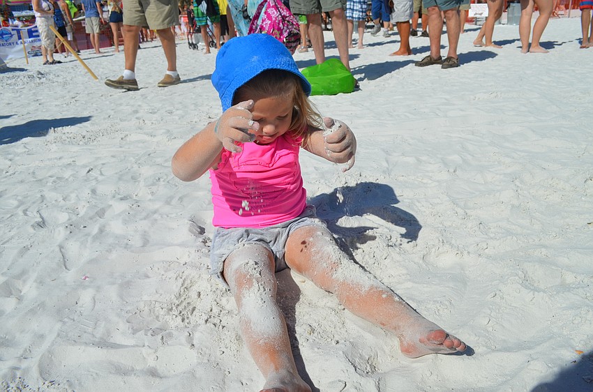 Sloan Rosenbger plays in the sand