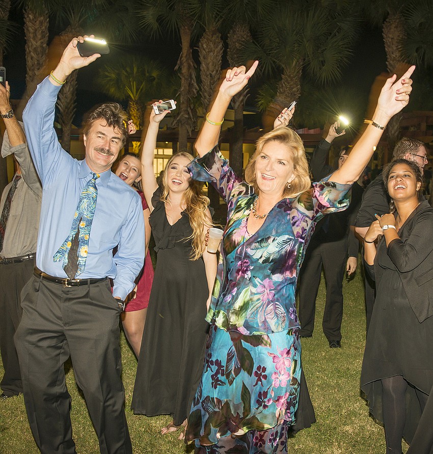 Dr. Michael Probstfeld (Dr. Carol F. Probstfeldâ€™s brother) and SCF President Dr. Carol F. Probstfeld celebrate at the SCF Foundation Inc.â€™s Evening Under the Stars Inauguration Concert.