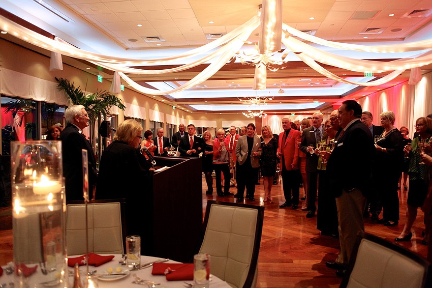 Attendees participate in a recommitment ceremony led by Judge Nancy Donnellan.