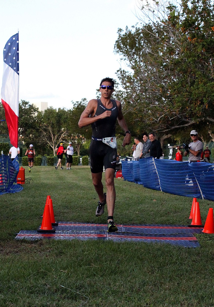 Ben Carlson, No. 2, 29, was the winner of the Longboat Key Sprint Triathlon Sunday, May 5, out at the Longboat Key Club. He finished the triathlon with a time of 55:26.5.