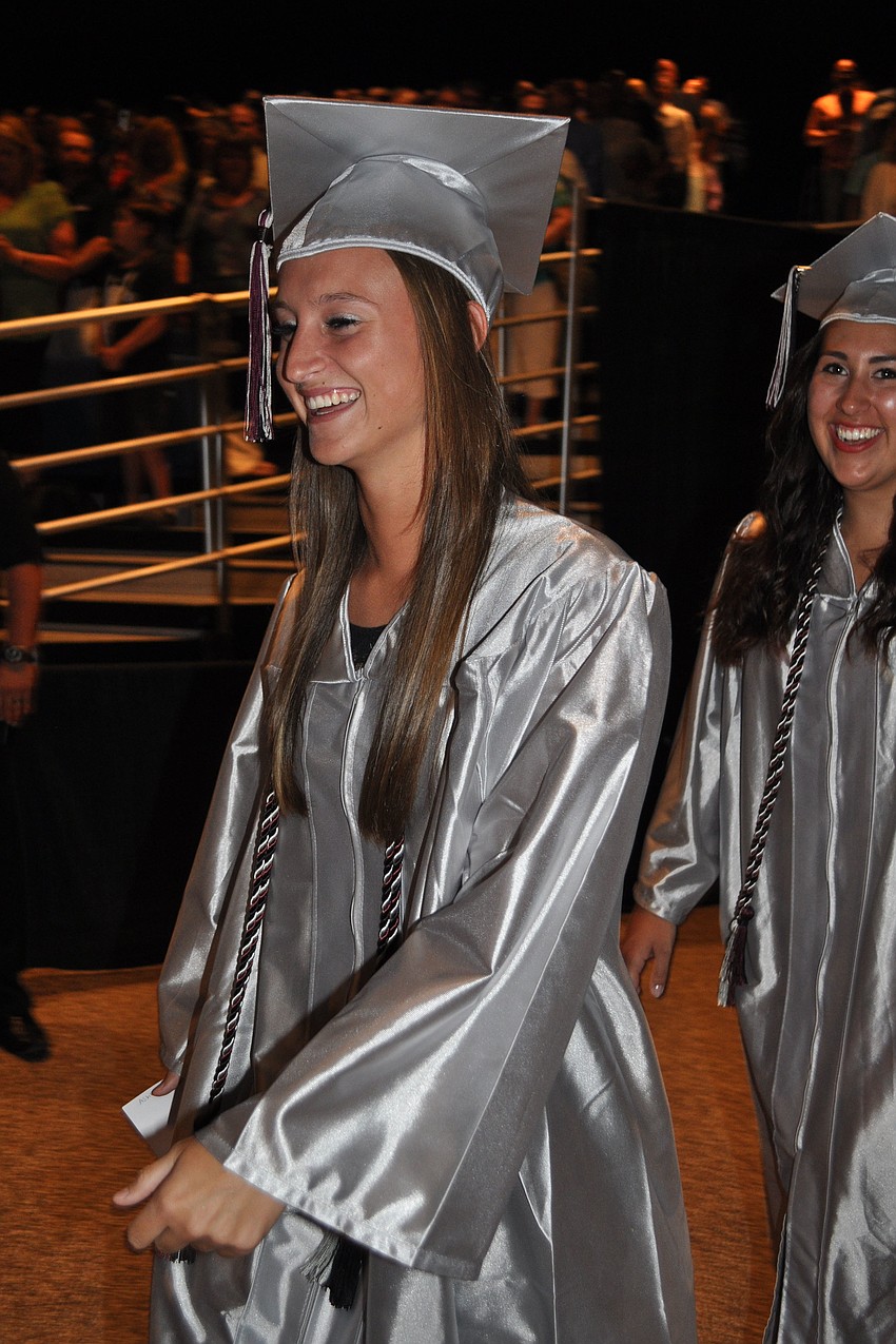 Ashley Allard couldnâ€™t contain her excitement as graduates entered the auditorium.