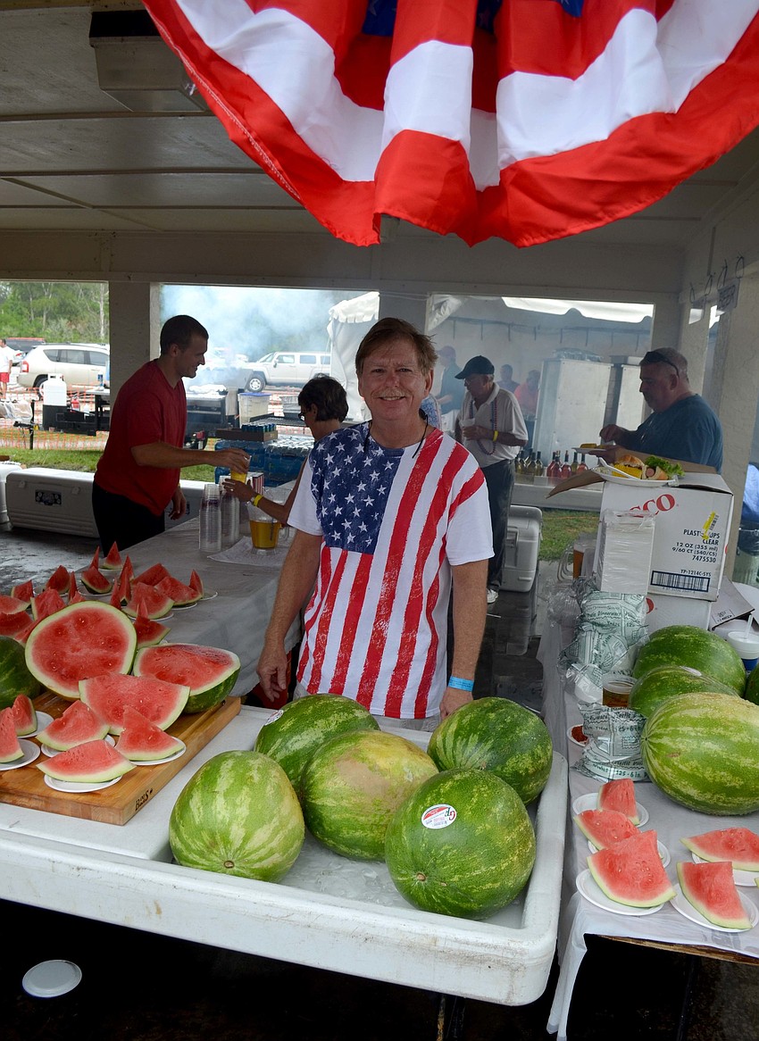 Mark Smith volunteers at the food and beverage booth.