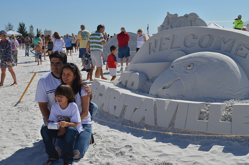 Diego, Luz and Santiago Toro pose for a family photo