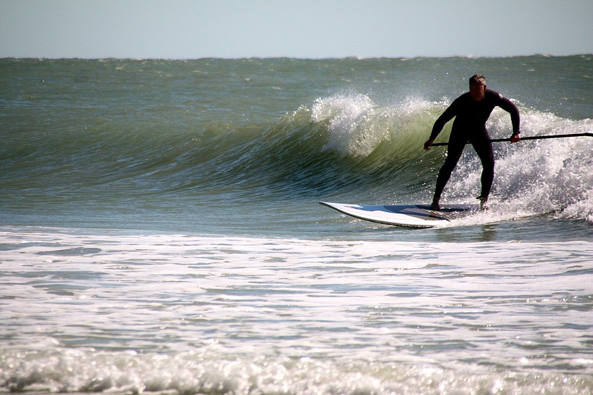 Surfers at Lido Beach.