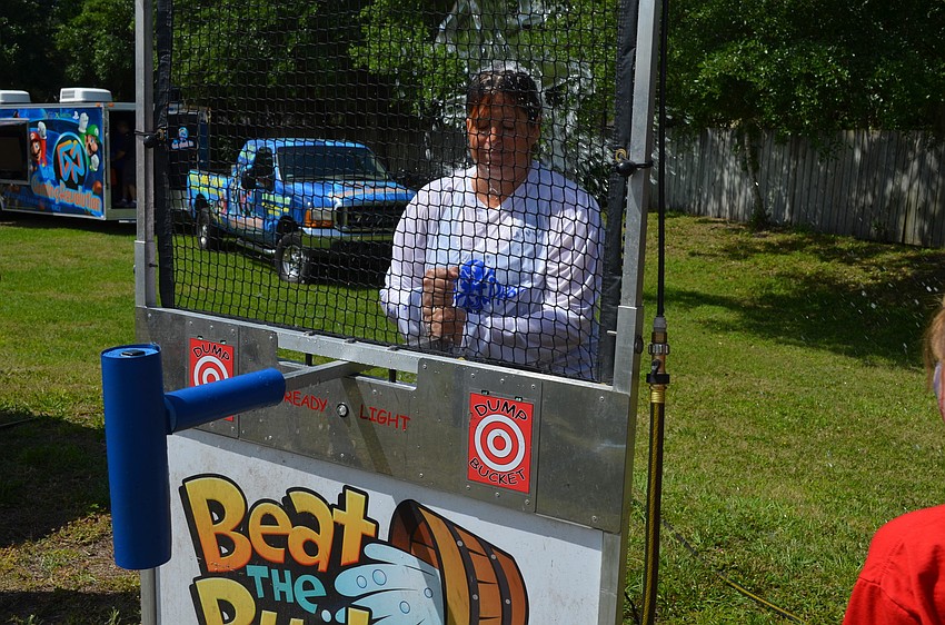 Maria Smith prepares to be dunked.