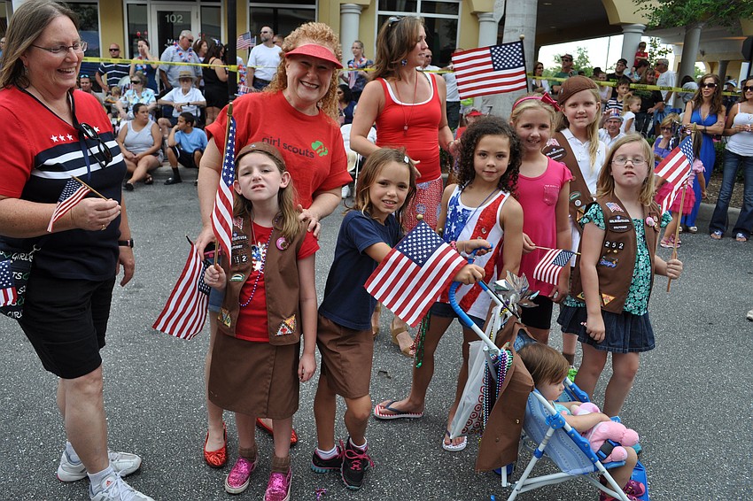 Girl Scout Troop 252 enjoy walking in the parade.