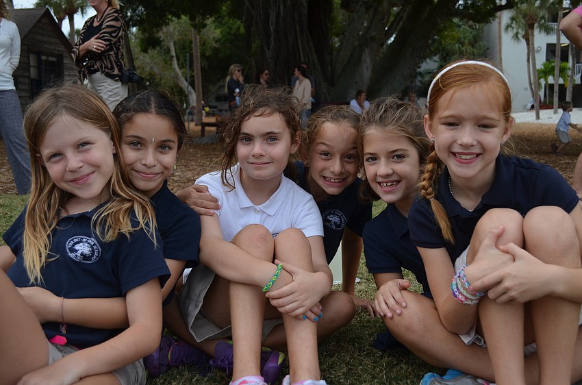 Third graders Evelina G., Divya M., Maria S., Roxy G., Emma B., and Kendall D. support the red team