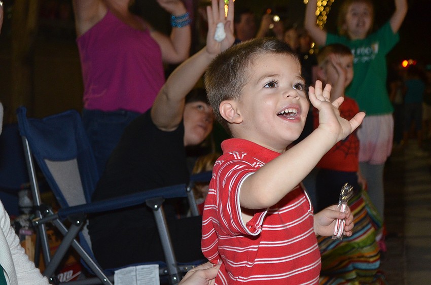 Cameron Lovell waves to Santa