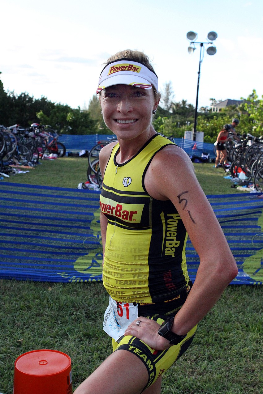 Jessica Crate, No. 51, 28, was the first woman to finish the triathlon with a time of 59:43.7.