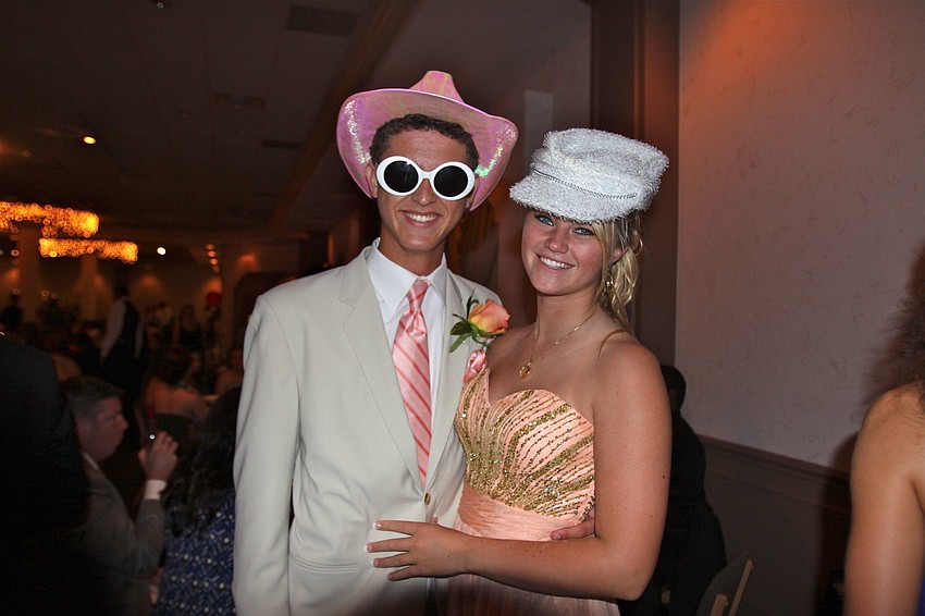 Henry Winkle and Samantha Wood  get ready to have their photo taken in the photo booth.