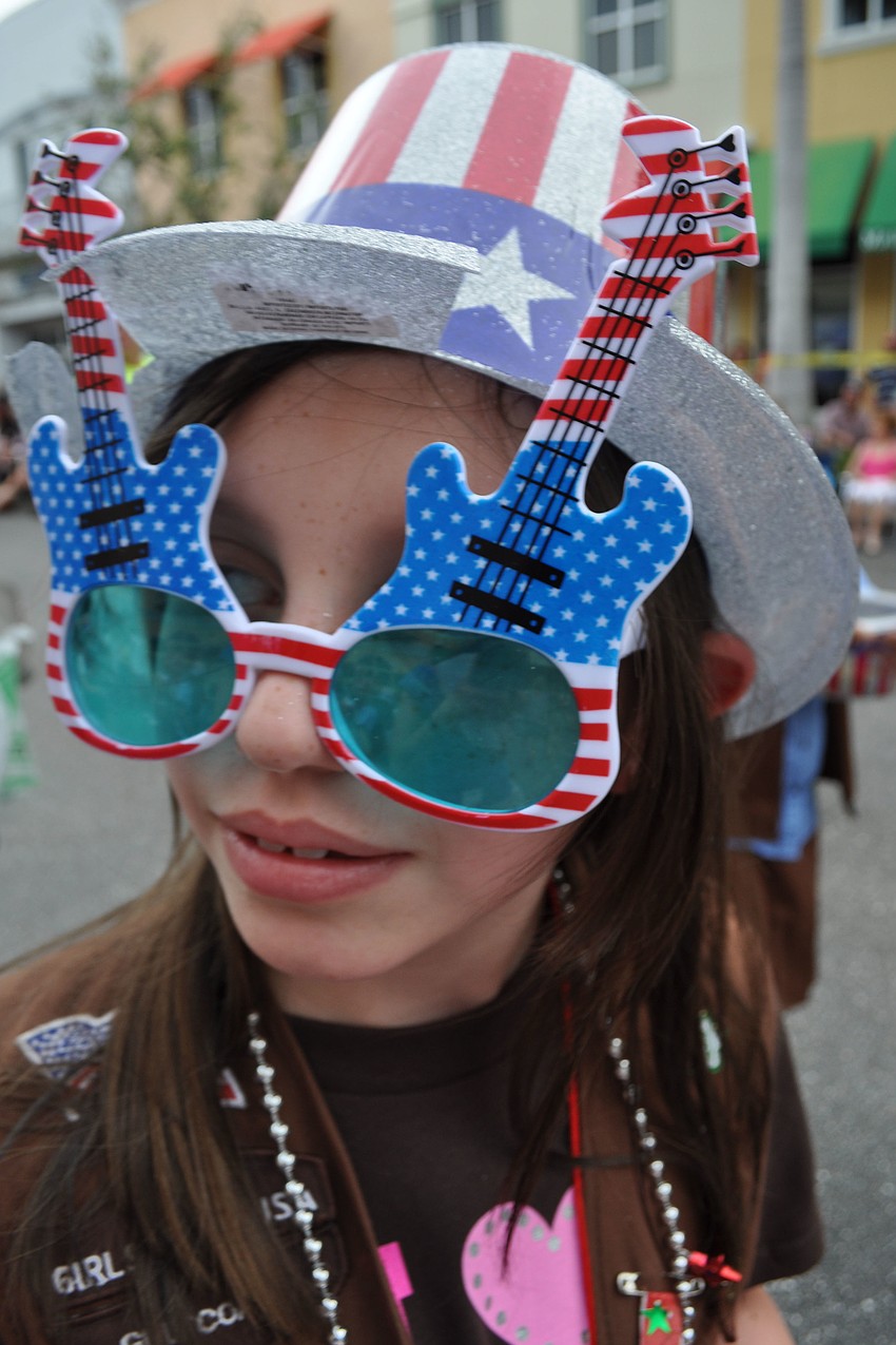 Kimberley Barr, 9, of Willis Elementary School, walks with Girl Scout troop 764.