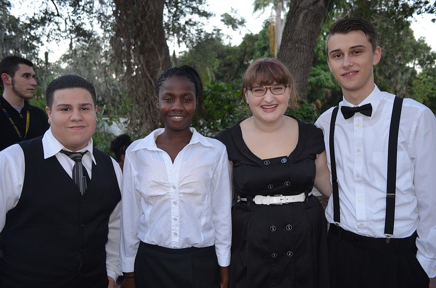 Booker High Schoolâ€™s Chamber Ensemble sang Christmas carols for guests.