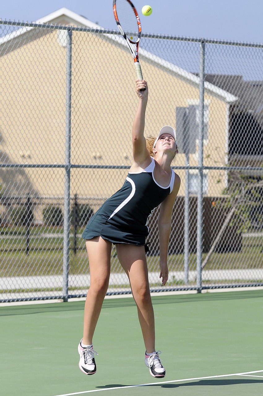 Lakewood Ranchâ€™s Casey Rowe serves the ball during her No. 2 doubles semifinal versus Sarasota.