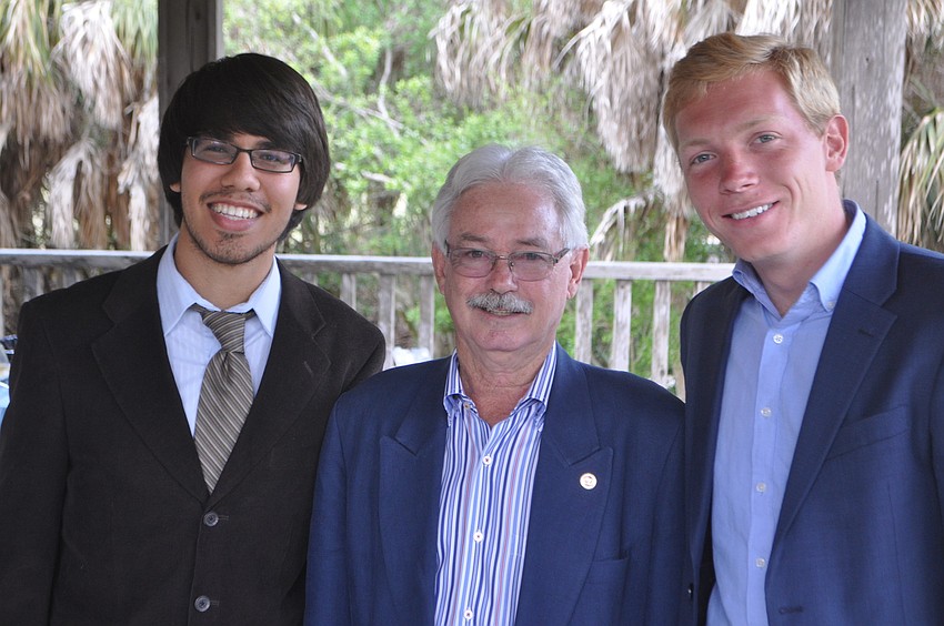 scholarship recipients Sean Binninger and Michael Long with Mayor Jim Brown, center