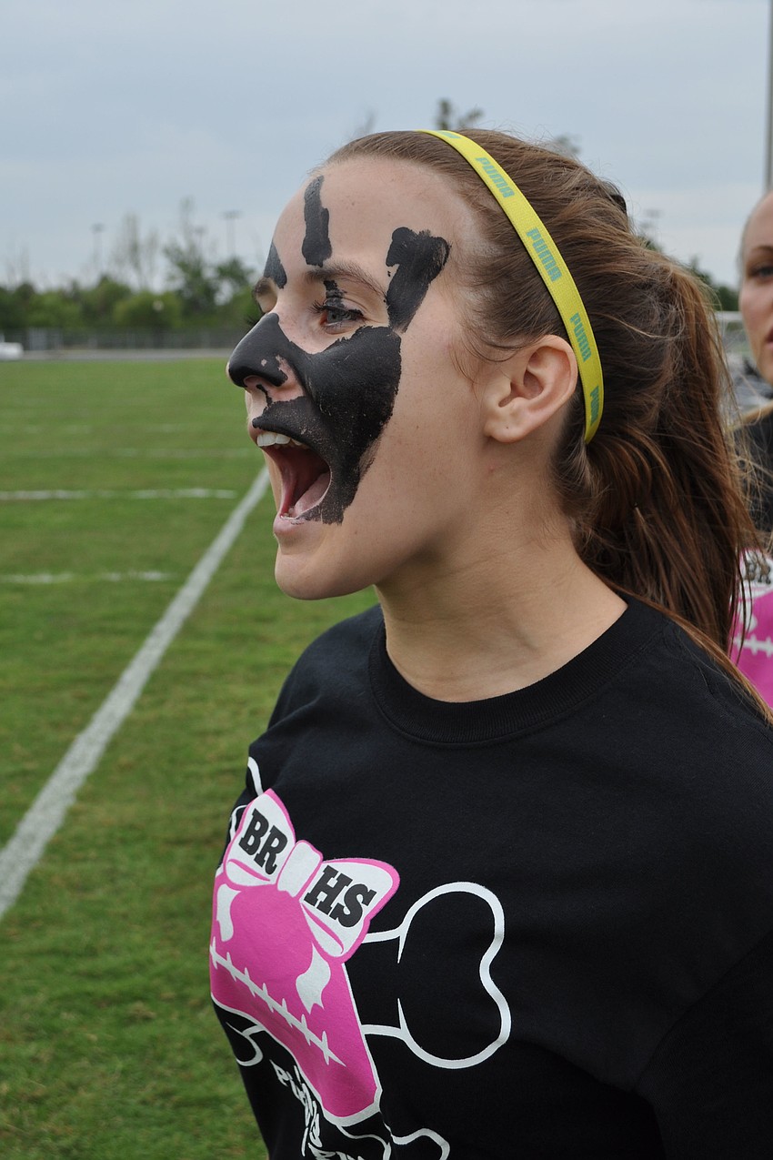 Senior Shelby Graves cheers on her teammates.