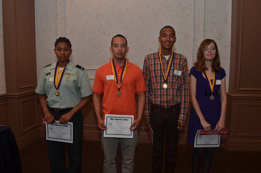 Booker High School juniors Kiana Jackson, Jose Cano, Angelo Buenano and Kelly Anne Altenbernd