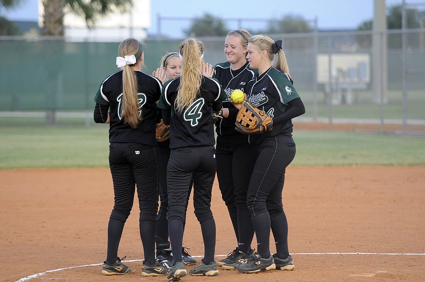 The Lakewood Ranch infield celebrates following one of pitcher Amanda Rakâ€™s 13 strikeouts.