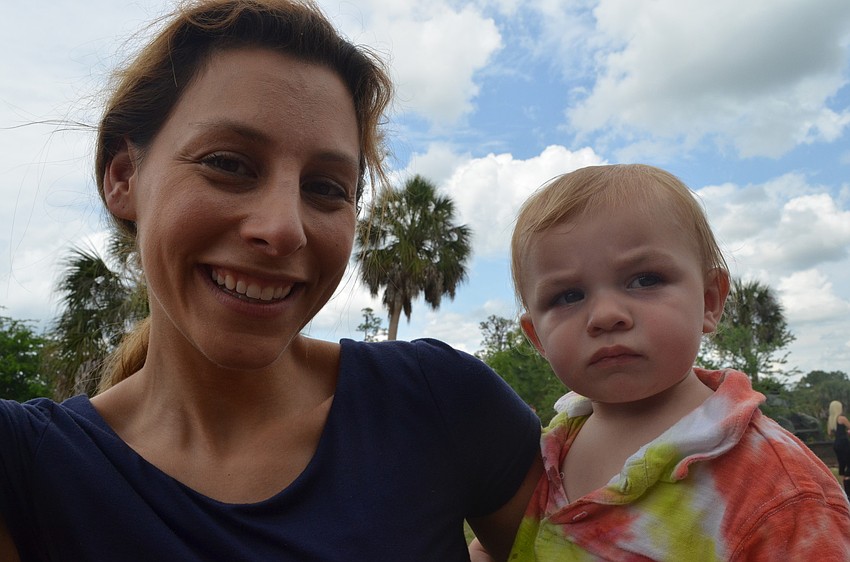 Alicia Zoller and her son Samuel enjoy the Earth Day festivities.