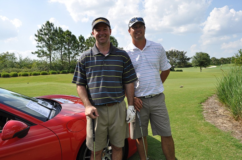 Jeff Guy of Syprett Meshad and Todd Evans of the Deep Creek Golf Club in Port Charlotte