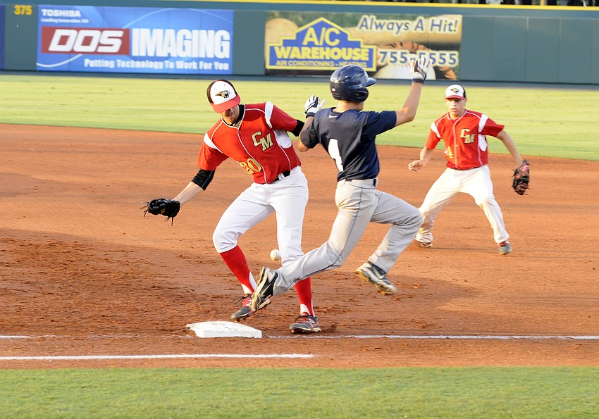 ODA freshman Trenton Radigan safely reaches first base.