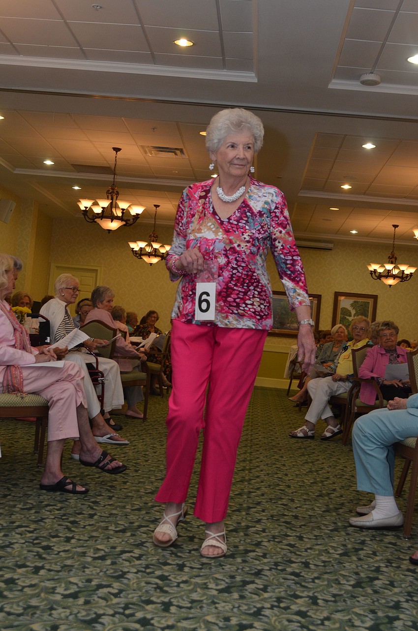 Joan Wall models a hot pink and white top from Softworks.